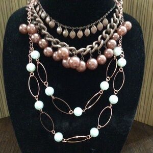 Lot of three Coppertone necklaces, two of which have matching earrings NWT